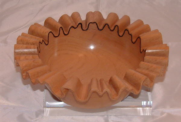 Bowl with carved rim